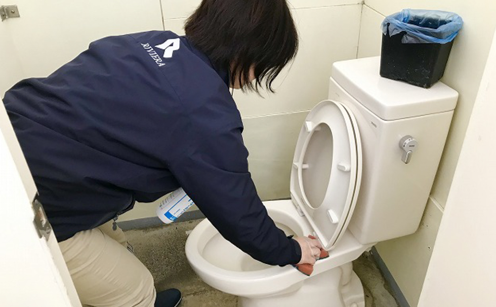 Cleaning local public toilets